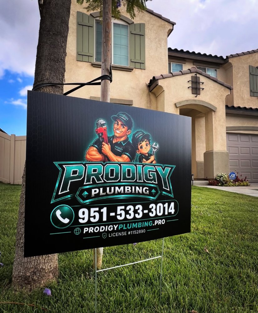 A Prodigy Plumbing yard sign in front of a home in Perris, CA